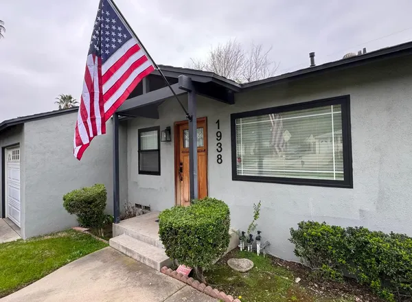 Completed house facade with flag