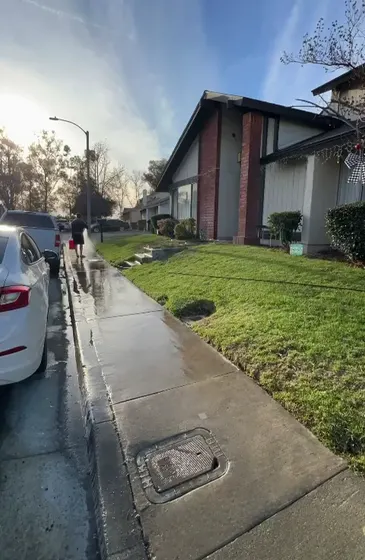 Pressure washing beside a house — video preview