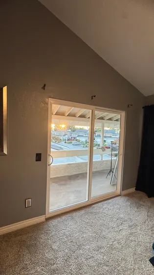 Unfinished room with exposed flooring