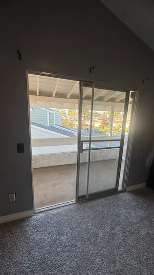 Patio door and unfinished room