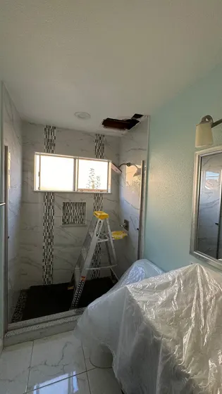 Prepared bathroom with protected fixtures