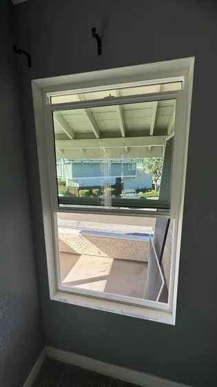 Installed window with interior trim