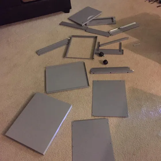 Disassembled cabinet/drawer components