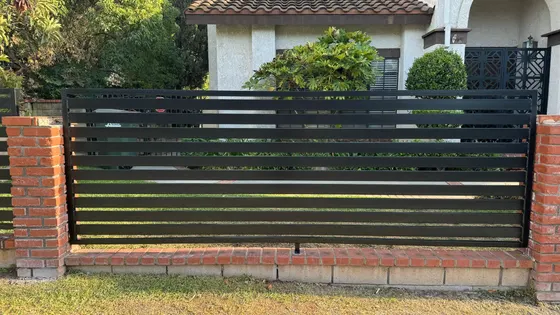 Completed slat fence