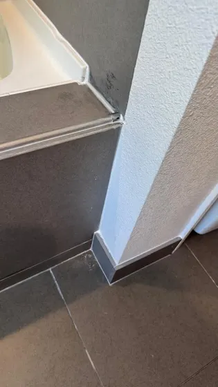Bathroom floor and wall repair