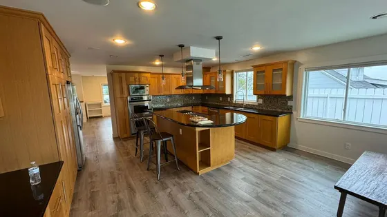 A kitchen remodeling, new vinyl flooring, new paint and full deep cleaning 